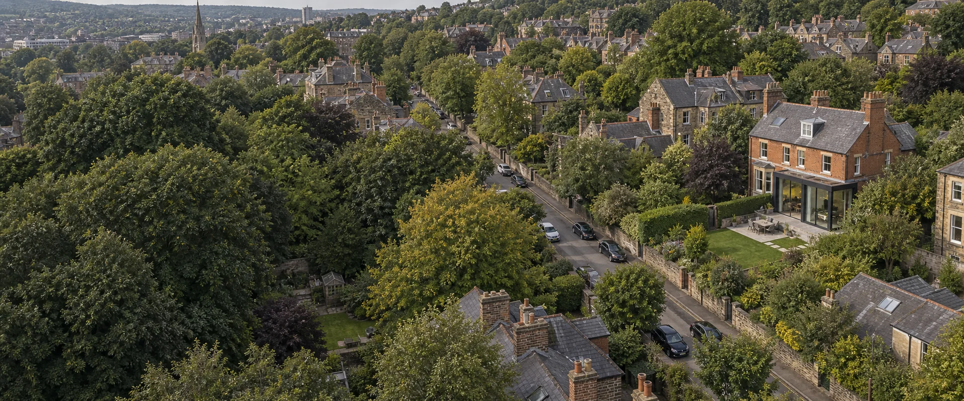 An aerial view of a neighbourhood of British homes and gardens